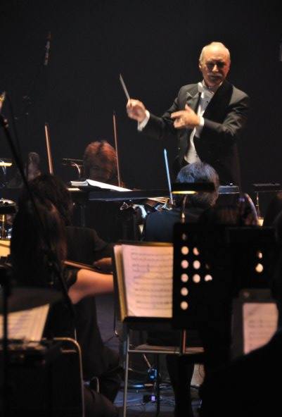 Brad Kelley conducting an orchestra